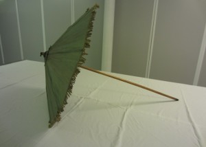Walking stick parasol covered in green silk trimmed with a short silk fringe, 1770s – 1800s. TWCMS: J1383 Walking stick parasol covered in green silk trimmed with a short silk fringe, 1770s – 1800s. TWCMS: J1383